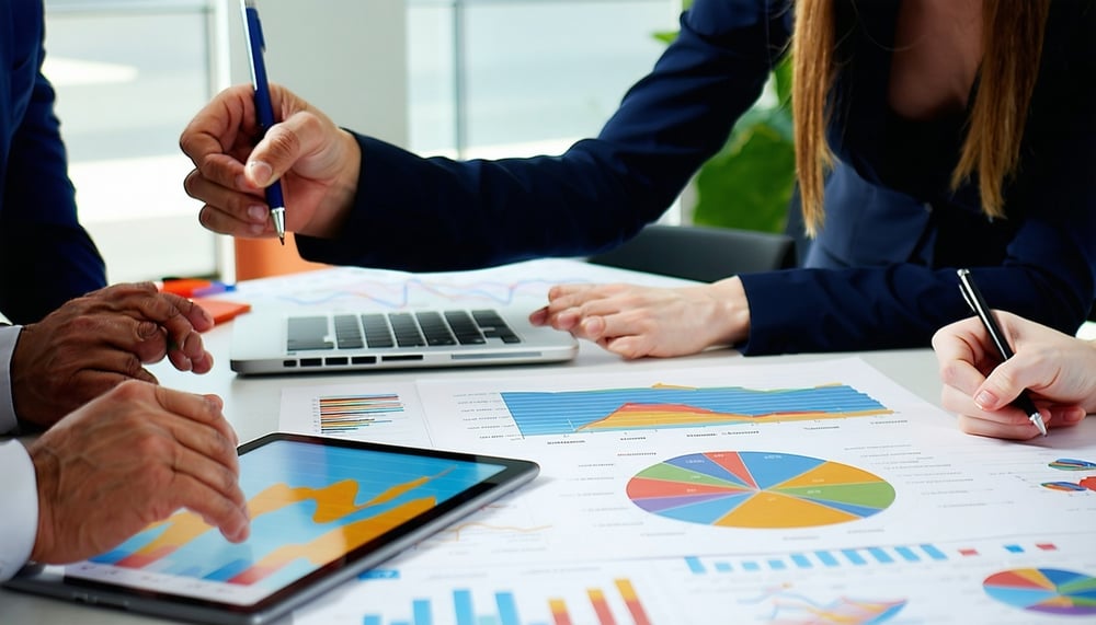 Digital marketing team analyzing growth metrics Digital marketing team analyzing growth metrics